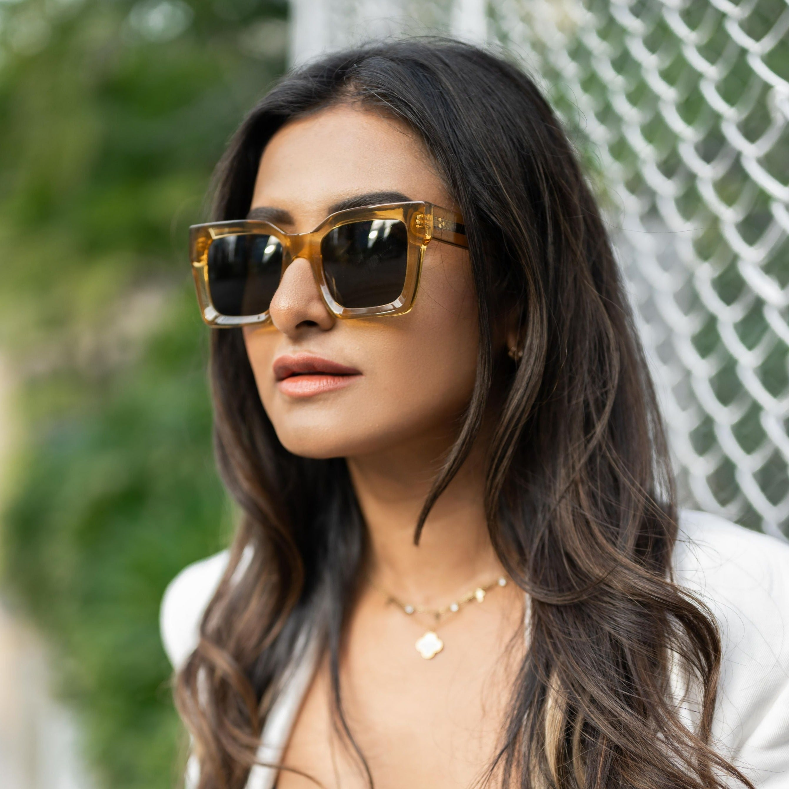 PRANWESHA WEARING TOKIO SUN IN HONEY/GREEN